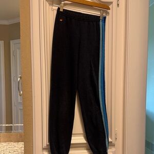 Aviator Nation Kids Black Joggers with Blue, purple, and pink Stripes